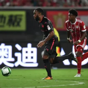 Alexandre Lacazette vs. David Alaba: Battle at the Shanghai Pre-Season Friendly between Bayern Munich and Arsenal