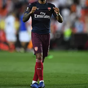 Alexandre Lacazette's Celebration: Arsenal Advance to Europa League Final after Dramatic Second Leg Win over Valencia