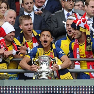 Alexis Sanchez (Arsenal) lift the FA Cup after the match. Arsenal 4: 0 Aston Villa