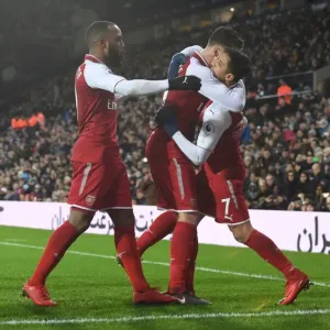 Alexis Sanchez, Calum Chambers, and Alexandre Lacazette: Celebrating a Goal for Arsenal against West Bromwich Albion (2017-18)