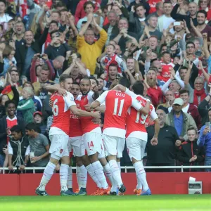 Alexis Sanchez celebrates scoring his 1st goal with his team mates