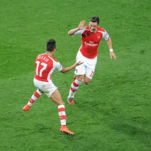 Alexis Sanchez and Mesut Ozil's Triumphant Moment: Arsenal's Third Goal vs. Galatasaray (2014/15 Champions League) Alexis Sanchez and Mesut Ozil's Triumphant Moment: Arsenal's Third Goal vs. Galatasaray (2014/15 Champions League)