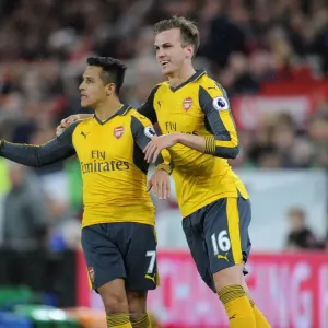 Alexis Sanchez and Rob Holding Celebrate Goal: Middlesbrough vs. Arsenal, Premier League 2016-17 Alexis Sanchez and Rob Holding Celebrate Goal: Middlesbrough vs. Arsenal, Premier League 2016-17