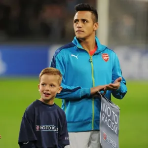 Alexis Sanchez and UEFA Mascot: Arsenal's Pre-Match Moment at Anderlecht's Constant Vanden Stock Stadium (2014-15 Champions League)