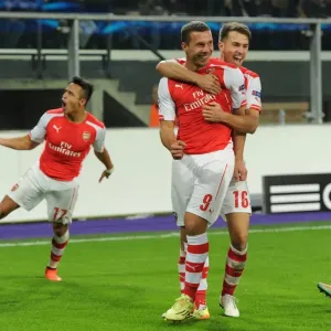Anderlecht vs. Arsenal: Podolski Scores Double as Gunners Triumph in Champions League Clash (October 2014)