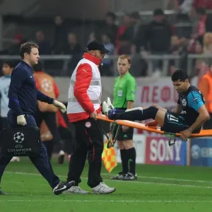 Andre Santos Carried Off Injured: Olympiacos vs Arsenal, UEFA Champions League, 2011