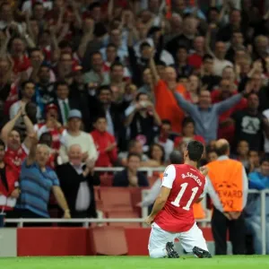 Andre Santos celebrates scoring Arsenals 2nd goal. Arsenal 2: 1 Olympiacos