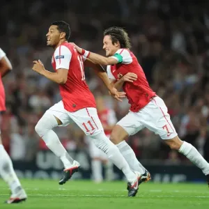 Andre Santos and Tomas Rosicky Celebrate Arsenal's Second Goal Against Olympiacos in the 2011-12 UEFA Champions League