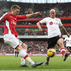 Andrej Arshavin (Arsenal) Paul Konchesky (Fulham) Andrej Arshavin (Arsenal) Paul Konchesky (Fulham)