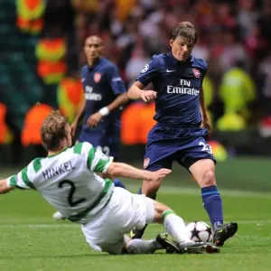 Andrey Arshavin (Arsenal) Andreas Hinkel (Celtic) Andrey Arshavin (Arsenal) Andreas Hinkel (Celtic)