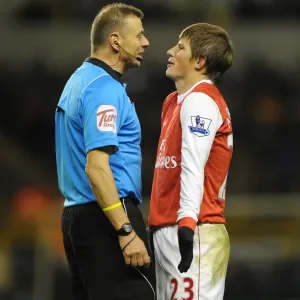 Andrey Arshavin (Arsenal) jokes with referee Mark Halsey. Wolverhampton Wanderers 0
