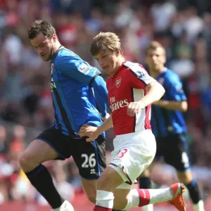 Andrey Arshavin (Arsenal) Matthew Bates (Middlesbrough) Andrey Arshavin (Arsenal) Matthew Bates (Middlesbrough)