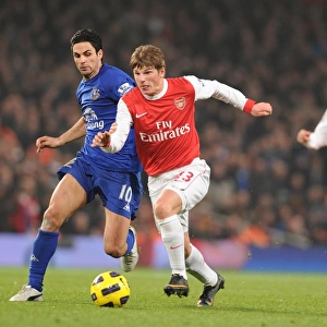 Andrey Arshavin (Arsenal) Mikel Arteta (Everton). Arsenal 2: 1 Everton, Barclays Premier League