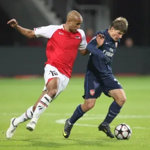Andrey Arshavin (Arsenal) Simon Poulsen (AZ Alkmaar)
