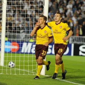 Andrey Arshavin celebrates scoring the 1st Arsenal goal with Jack Wilshere