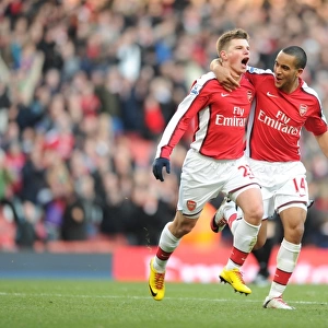 Andrey Arshavin celebrates scoring the 3rd Arsenal goal with Theo Walcott