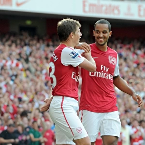 Andrey Arshavin celebrates scoring Arsenals goal with Theo Walcott. Arsenal 1: 0 Swansea City