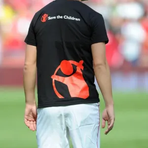 Andrey Arshavin in a Save the Children t-shirt Print