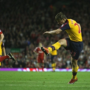 Andrey Arshavin shoots past Liverpool goalkeeper Pepe