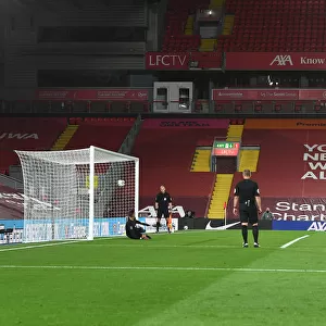 Empty Anfield: Ainsley Maitland-Niles Scores Decisive Penalty in Carabao Cup Showdown Amidst COVID-19 Restrictions