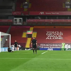 Empty Anfield: Ainsley Maitland-Niles Scores Decisive Penalty in Carabao Cup Showdown Amidst COVID-19 Restrictions