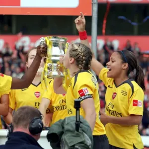 Anita Asante and Jayne Ludlow (Arsenal) lift the FA Cup Trophy Anita Asante and Jayne Ludlow (Arsenal) lift the FA Cup Trophy