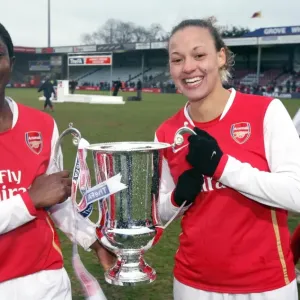 Anita Asante and Lianne Sanderson (Arsenal) with the League Cup Trophy