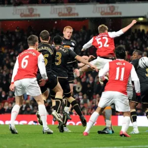 Antolin Alcaraz (Wigan) scores an own goal for Arsenals 1st goal. Arsenal 2