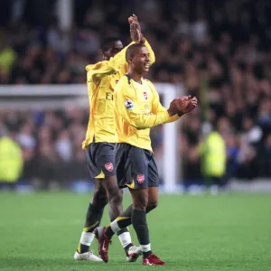 Armand Traore and Johan Djourou (Arsenal) clap the fans after the match