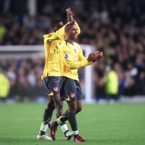 Armand Traore and Johan Djourou (Arsenal) clap the fans after the match