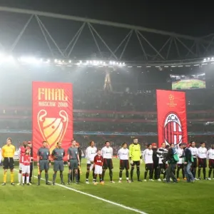 Arsenal and AC Milan line up before the match Arsenal and AC Milan line up before the match