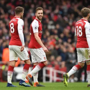 Arsenal: Calum Chambers and Aaron Ramsey in Deep Conversation during Arsenal v Stoke City Match, 2018 Arsenal: Calum Chambers and Aaron Ramsey in Deep Conversation during Arsenal v Stoke City Match, 2018