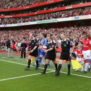 Arsenal captain Gilberot leads the team out for the last home game of the season