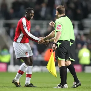 Arsenal captain Kolo Toure shakes hands with officials