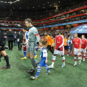 Arsenal captain Manuel Almunia followed by Bacary Sagna and Gael Clichy leads out the team before the match. Arsenal 5: 0 FC Porto, UEFA Champions League First Knockout Round, Second Leg, Emirates Stadium, Arsenal Football Club, London, 9 / 3 / 2010. Credit: Stuart MacFarlane / Arsenal
