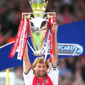 Arsenal captain Tony Adams with the F. A. Barclaycard Premiership Trophy