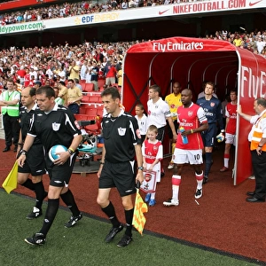 Arsenal captain William Gallas leads out the team