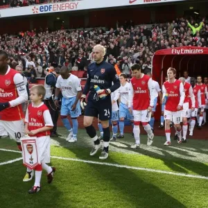 Arsenal captain William Gallas leads out the team before the match Arsenal captain William Gallas leads out the team before the match