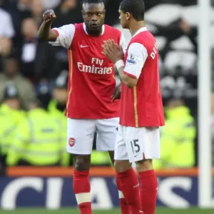 Arsenal captain William Gallas talks with Denilson before the match