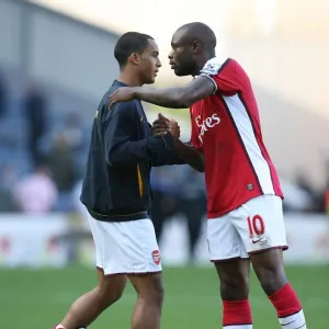 Arsenal captain William Gallas with Theo Walcott after the match Arsenal captain William Gallas with Theo Walcott after the match