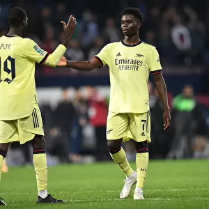 Arsenal Celebrate Carabao Cup Victory Over West Bromwich Albion: Saka and Pepe