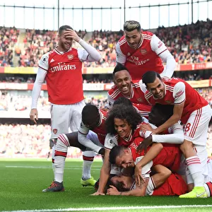 Arsenal Celebrate: David Luiz Scores Against AFC Bournemouth in Premier League (2019-20)
