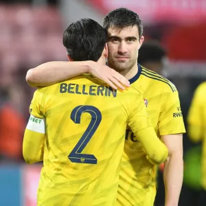 Arsenal Celebrate FA Cup Victory Over AFC Bournemouth: Hector Bellerin and Sokratis Embrace