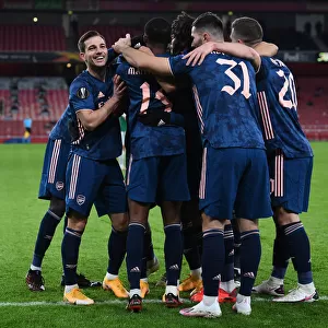 Arsenal Celebrate First Goal Against Rapid Wien in Europa League