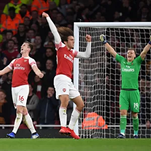 Arsenal Celebrate Hard-Fought Victory Over Tottenham Hotspur: Holding, Guendouzi, Leno