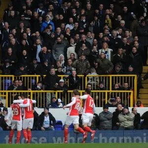 Arsenal Celebrate Mesut Ozil's Goal Against Tottenham Hotspur in the Premier League Arsenal Celebrate Mesut Ozil's Goal Against Tottenham Hotspur in the Premier League