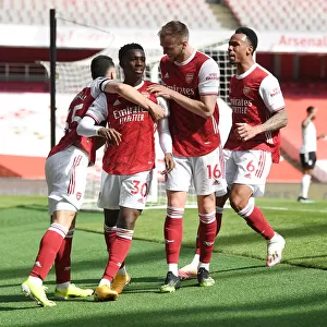Arsenal Celebrate Nketiah's Goal Against Fulham in Empty Emirates Stadium (2020-21)
