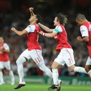 Arsenal Celebrate: Rosicky and Santos Score in Champions League Win over Olympiacos (2011-12)
