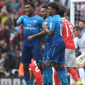 Arsenal Celebrate: Theo Walcott, Alex Iwobi, Reiss Nelson (vs Benfica, Emirates Cup 2017-18) Arsenal Celebrate: Theo Walcott, Alex Iwobi, Reiss Nelson (vs Benfica, Emirates Cup 2017-18)