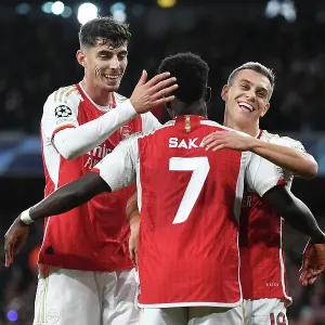 Arsenal Celebrate Trossard's Goal: Arsenal FC vs Sevilla FC, UEFA Champions League 2023-24